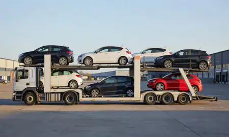 Car transporter parked in an industrial area of Southampton, Hampshire, United Kingdom