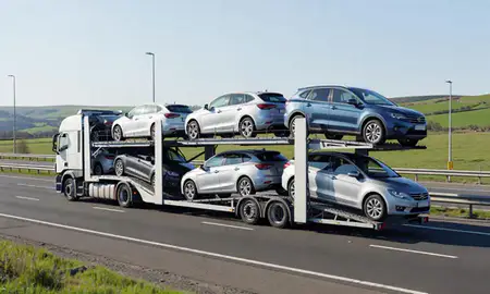 Multi-level car carrier on the motorway to Herefordshire, United Kingdom