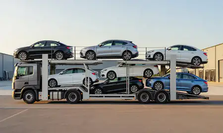 Car transporter parked in an industrial area of Hereford, Herefordshire, United Kingdom