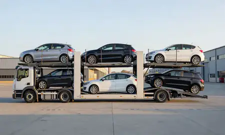 Car transporter parked in an industrial area of Hertfordshire, United Kingdom