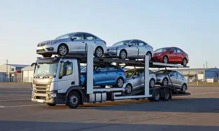 Car transporter loaded with vehicles in Borehamwood, Hertfordshire, United Kingdom