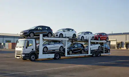 Car transporter loaded with vehicles in Hemel Hempstead, Hertfordshire, United Kingdom