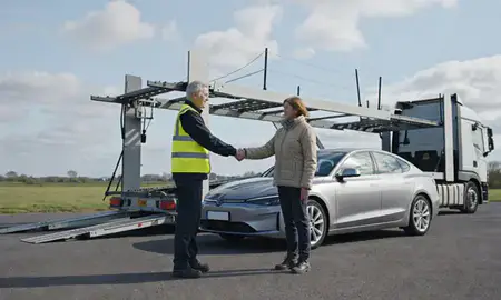 Vehicle owner beside their delivered car in Hitchin, Hertfordshire, United Kingdom