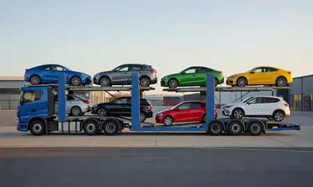 Car transporter parked in an industrial area of St Albans, Hertfordshire, United Kingdom