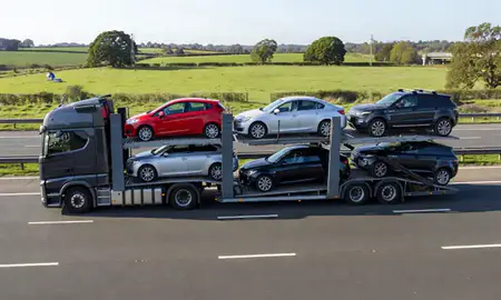 Multi-level car carrier on the motorway to Hertfordshrie, United Kingdom