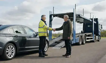 Vehicle owner beside their delivered car in Stevenage, Hertfordshrie, United Kingdom