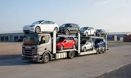 Car transporter loaded with vehicles in Canterbury, Kent, United Kingdom