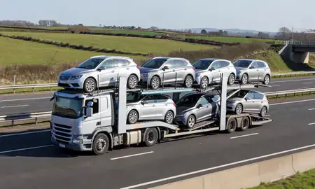 Multi-level car carrier on the motorway to Chatham, Kent, United Kingdom