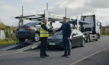 Vehicle owner beside their delivered car in Maidstone, Kent, United Kingdom