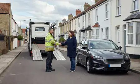 Vehicle owner beside their delivered car in Margate, Kent, United Kingdom