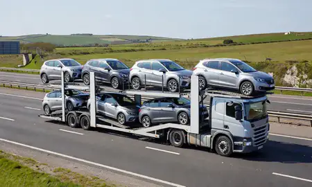 Multi-level car carrier on the motorway to Ramsgate, Kent, United Kingdom