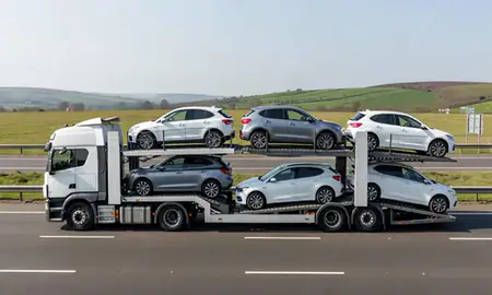 Multi-level car carrier on the motorway to Royal Tunbridge Wells, Kent, United Kingdom