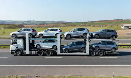 Multi-level car carrier on the motorway to Lancashire, United Kingdom