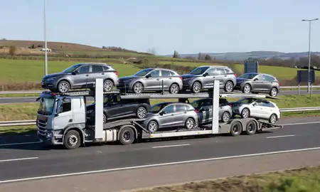 Multi-level car carrier on the motorway to Accrington, Lancashire, United Kingdom