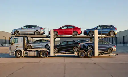 Car transporter parked in an industrial area of Bamber Bridge, Lancashire, United Kingdom