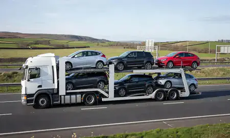Multi-level car carrier on the motorway to Burnley, Lancashire, United Kingdom
