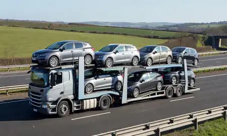 Multi-level car carrier on the motorway to Fulwood, Lancashire, United Kingdom