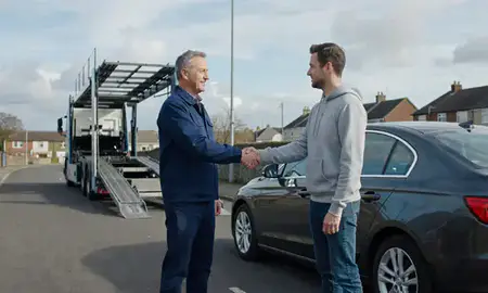 Vehicle owner beside their delivered car in Lancaster, Lancashire, United Kingdom