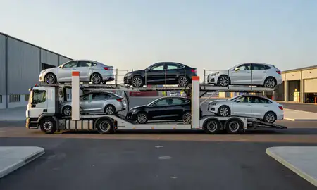 Car transporter parked in an industrial area of Lancaster, Lancashire, United Kingdom