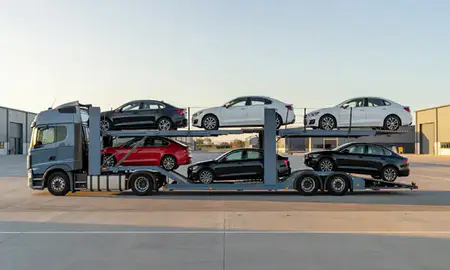 Car transporter parked in an industrial area of Leyland, Lancashire, United Kingdom