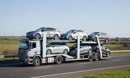 Multi-level car carrier on the motorway to Lytham St Annes, Lancashire, United Kingdom