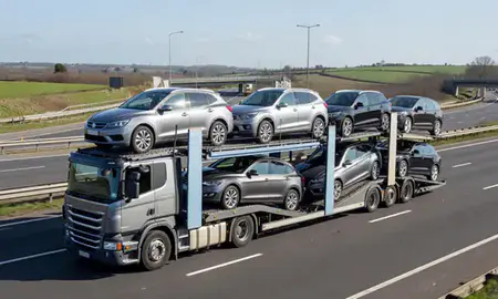 Multi-level car carrier on the motorway to Preston, Lancashire, United Kingdom