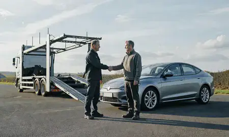 Vehicle owner beside their delivered car in Leicestershire, United Kingdom