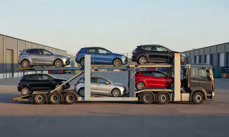 Car transporter parked in an industrial area of Leicestershire, United Kingdom