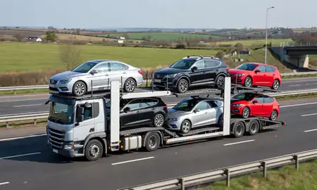 Multi-level car carrier on the motorway to Coalville, Leicestershire, United Kingdom
