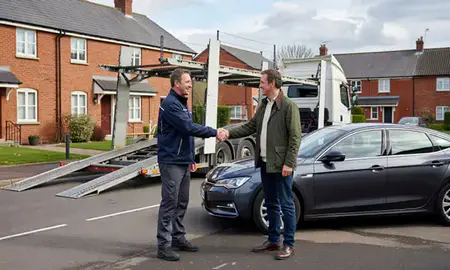 Vehicle owner beside their delivered car in Hinckley, Leicestershire, United Kingdom