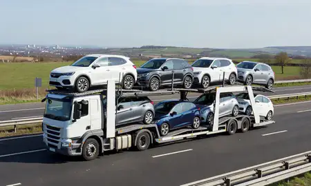 Multi-level car carrier on the motorway to Leicester, Leicestershire, United Kingdom