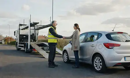 Vehicle owner beside their delivered car in Leicester, Leicestershire, United Kingdom