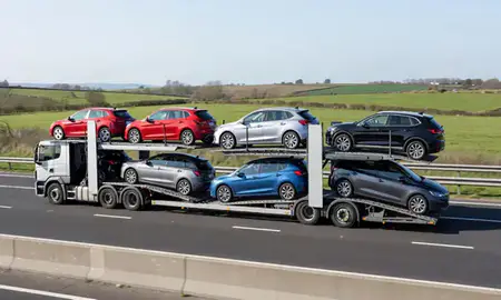 Multi-level car carrier on the motorway to Loughborough, Leicestershire, United Kingdom