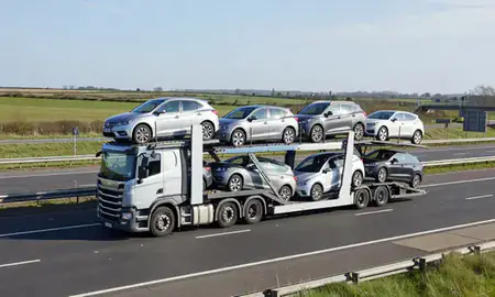 Multi-level car carrier on the motorway to Lincolnshire, United Kingdom