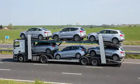 Multi-level car carrier on the motorway to Grantham, Lincolnshire, United Kingdom