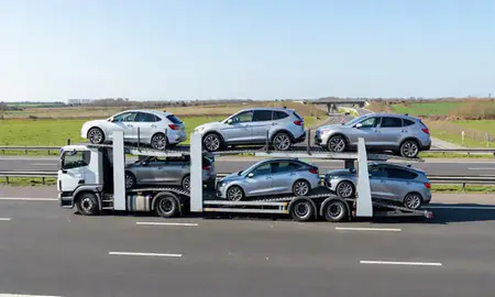Multi-level car carrier on the motorway to Grimsby, Lincolnshire, United Kingdom