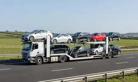 Multi-level car carrier on the motorway to Lincoln, Lincolnshire, United Kingdom