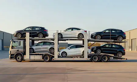 Car transporter parked in an industrial area of Lincoln, Lincolnshire, United Kingdom