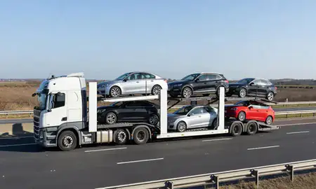 Multi-level car carrier on the motorway to Scunthorpe, Lincolnshire, United Kingdom