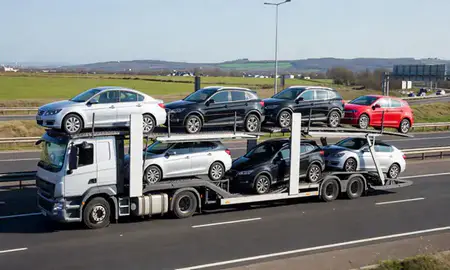 Multi-level car carrier on the motorway to Merseyside, United Kingdom