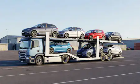 Car transporter loaded with vehicles in Merseyside, United Kingdom