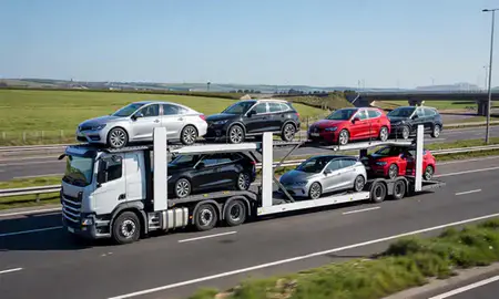 Multi-level car carrier on the motorway to Bebington, Merseyside, United Kingdom