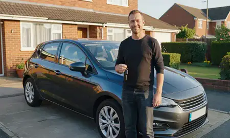 Car delivered to a driveway in Birkenhead, Merseyside, United Kingdom