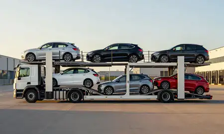 Car transporter parked in an industrial area of Birkenhead, Merseyside, United Kingdom