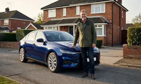 Customer with their delivered car in Bootle, Merseyside, United Kingdom