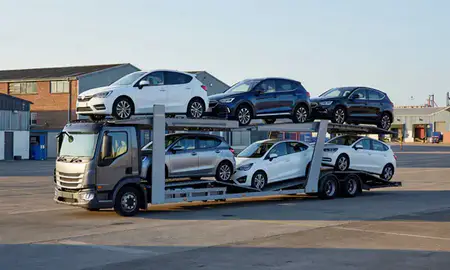 Car transporter loaded with vehicles in Bootle, Merseyside, United Kingdom