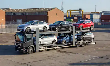 Car transporter loaded with vehicles in Liverpool, Merseyside, United Kingdom