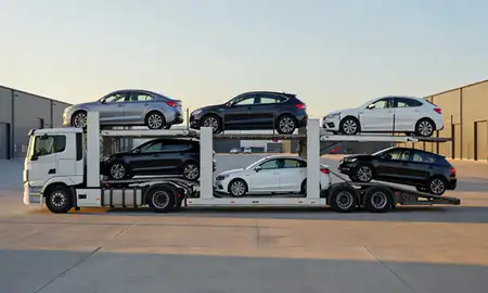 Car transporter parked in an industrial area of Southport, Merseyside, United Kingdom