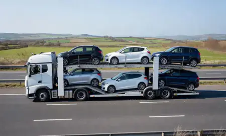 Multi-level car carrier on the motorway to Mid Glamorgan, United Kingdom