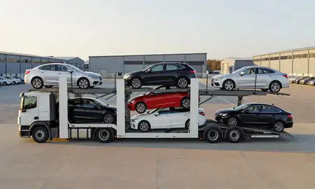 Car transporter parked in an industrial area of Mid Glamorgan, United Kingdom